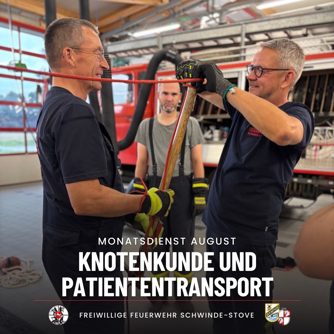 Drei Männer mit einer Leine und einer Axt